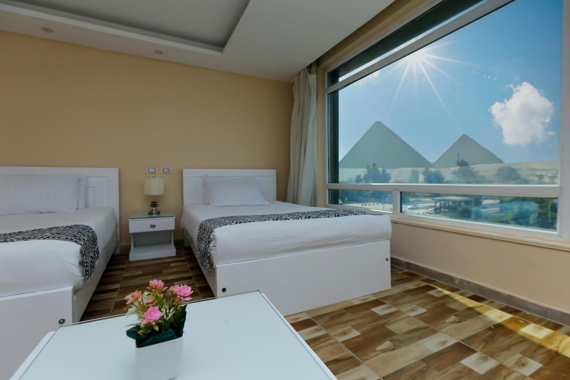 Turquoise Pyramids & Grand Egyptian museum view Hotel
