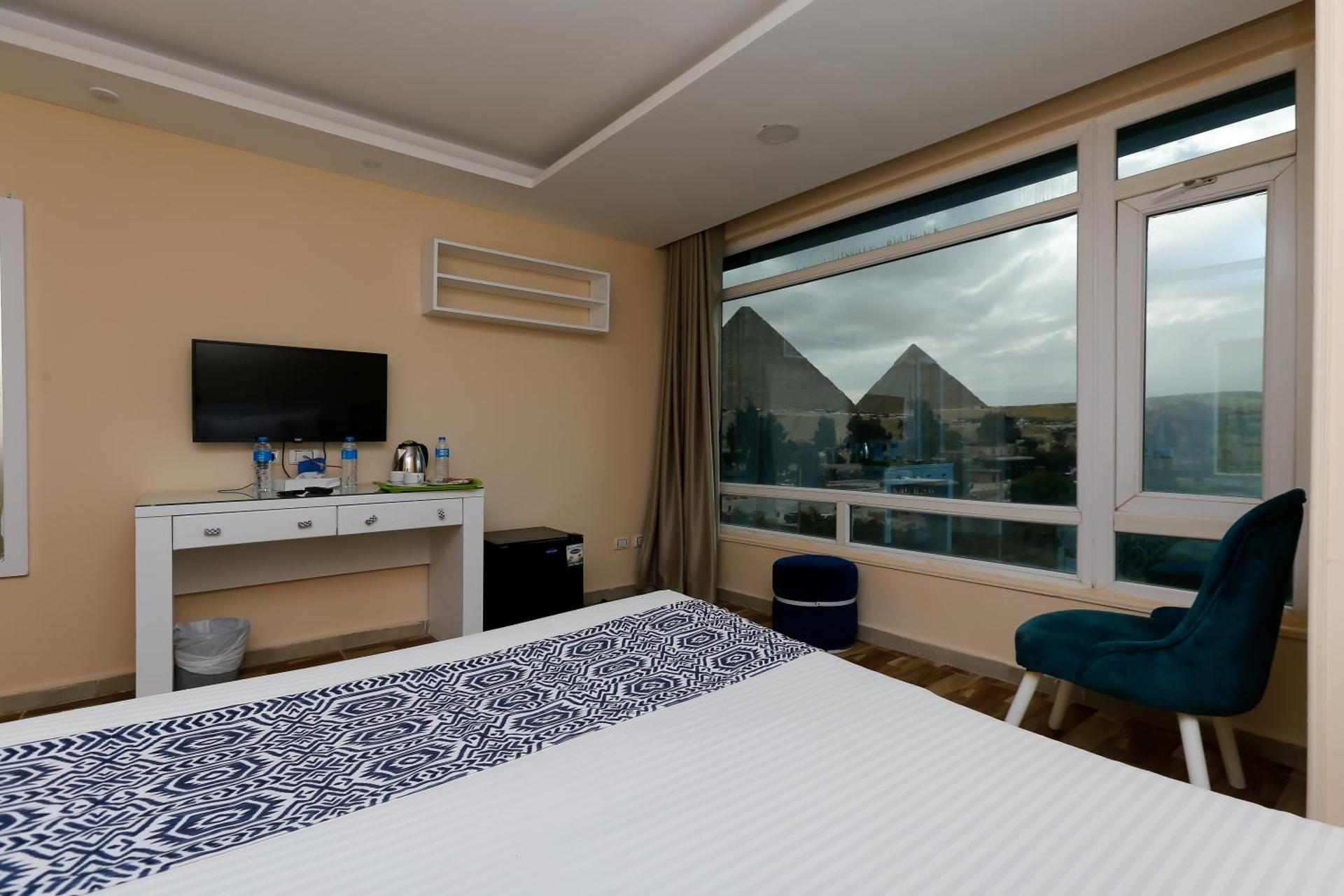 Turquoise Pyramids & Grand Egyptian museum view Hotel