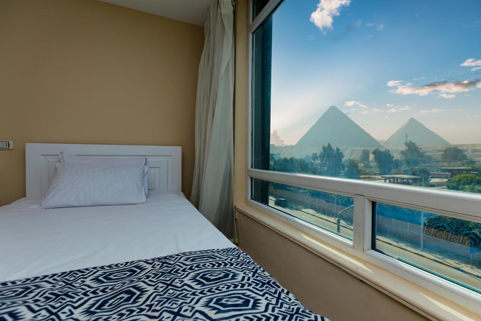 Turquoise Pyramids & Grand Egyptian museum view Hotel