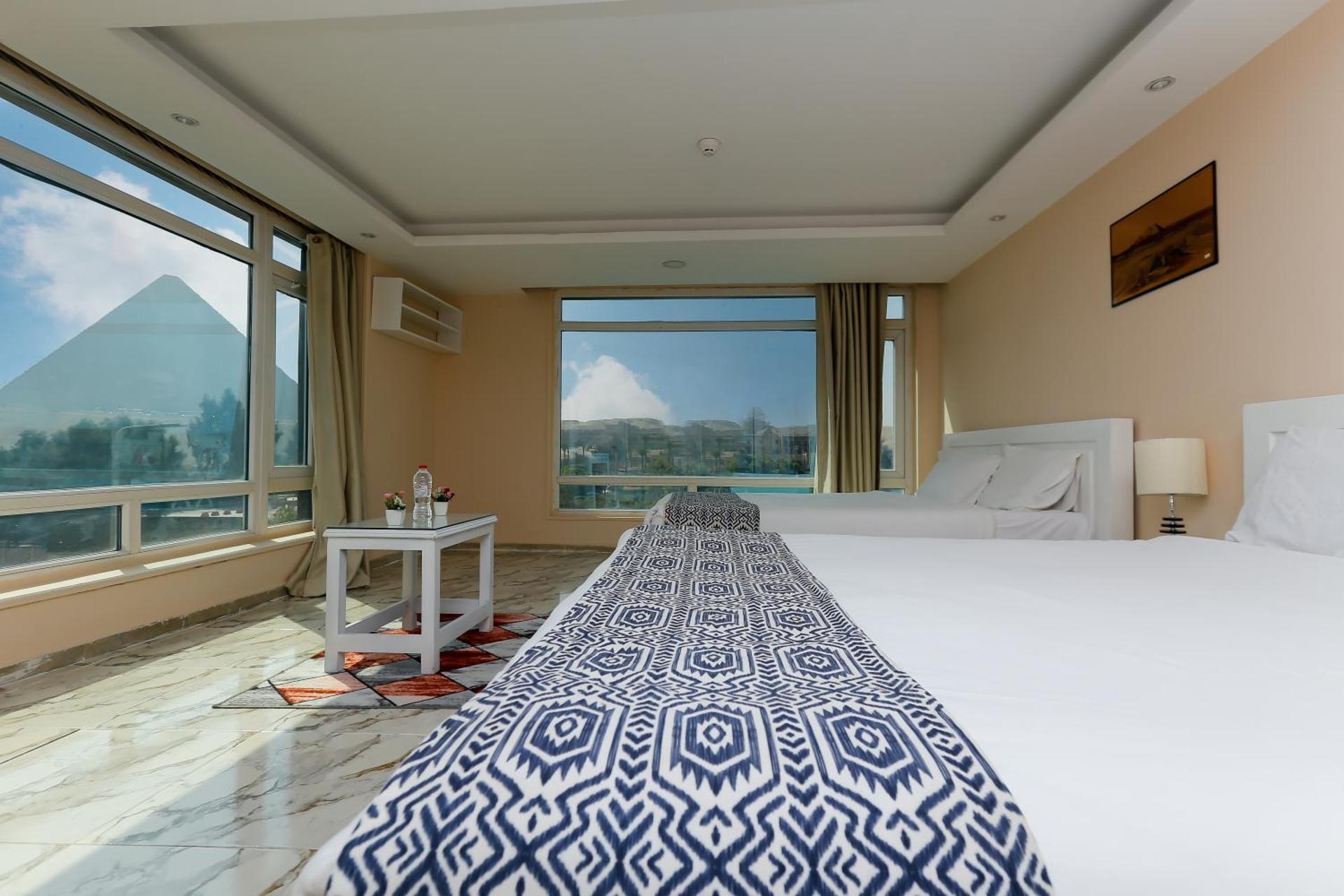 Turquoise Pyramids & Grand Egyptian museum view Hotel