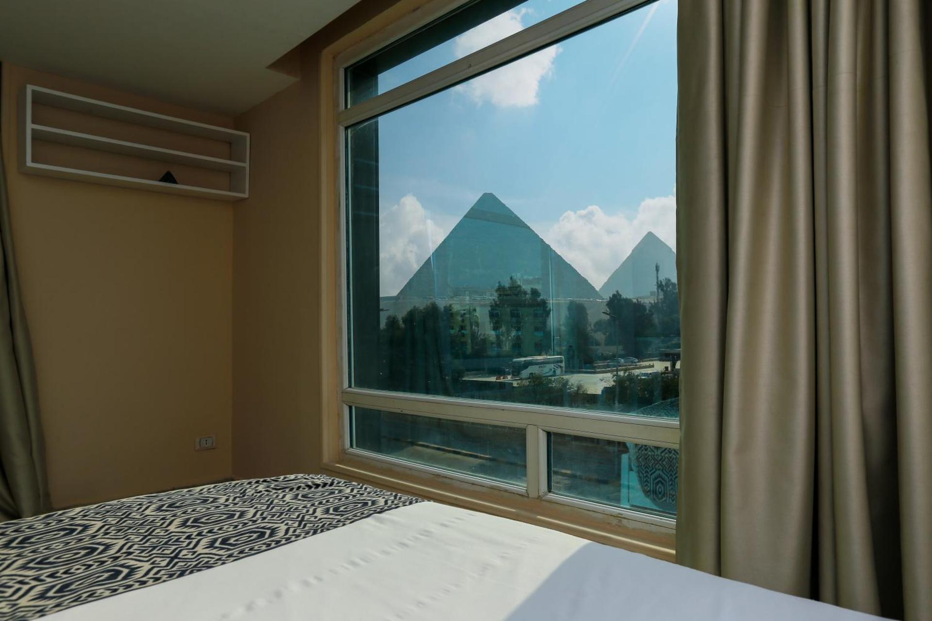 Turquoise Pyramids & Grand Egyptian museum view Hotel