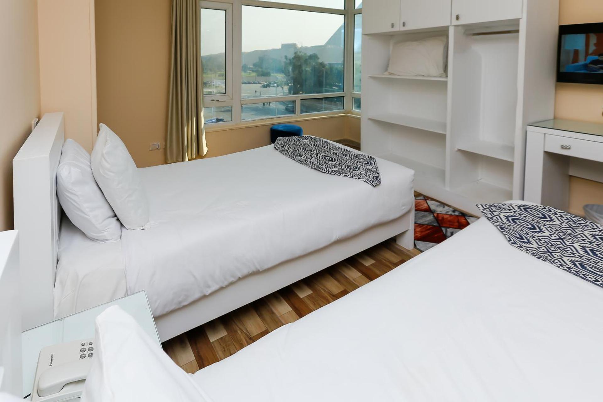 Turquoise Pyramids & Grand Egyptian museum view Hotel