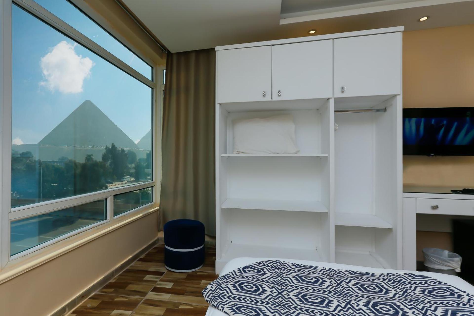 Turquoise Pyramids & Grand Egyptian museum view Hotel