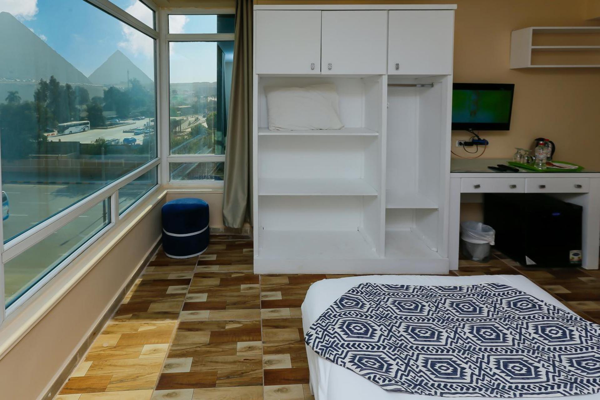 Turquoise Pyramids & Grand Egyptian museum view Hotel