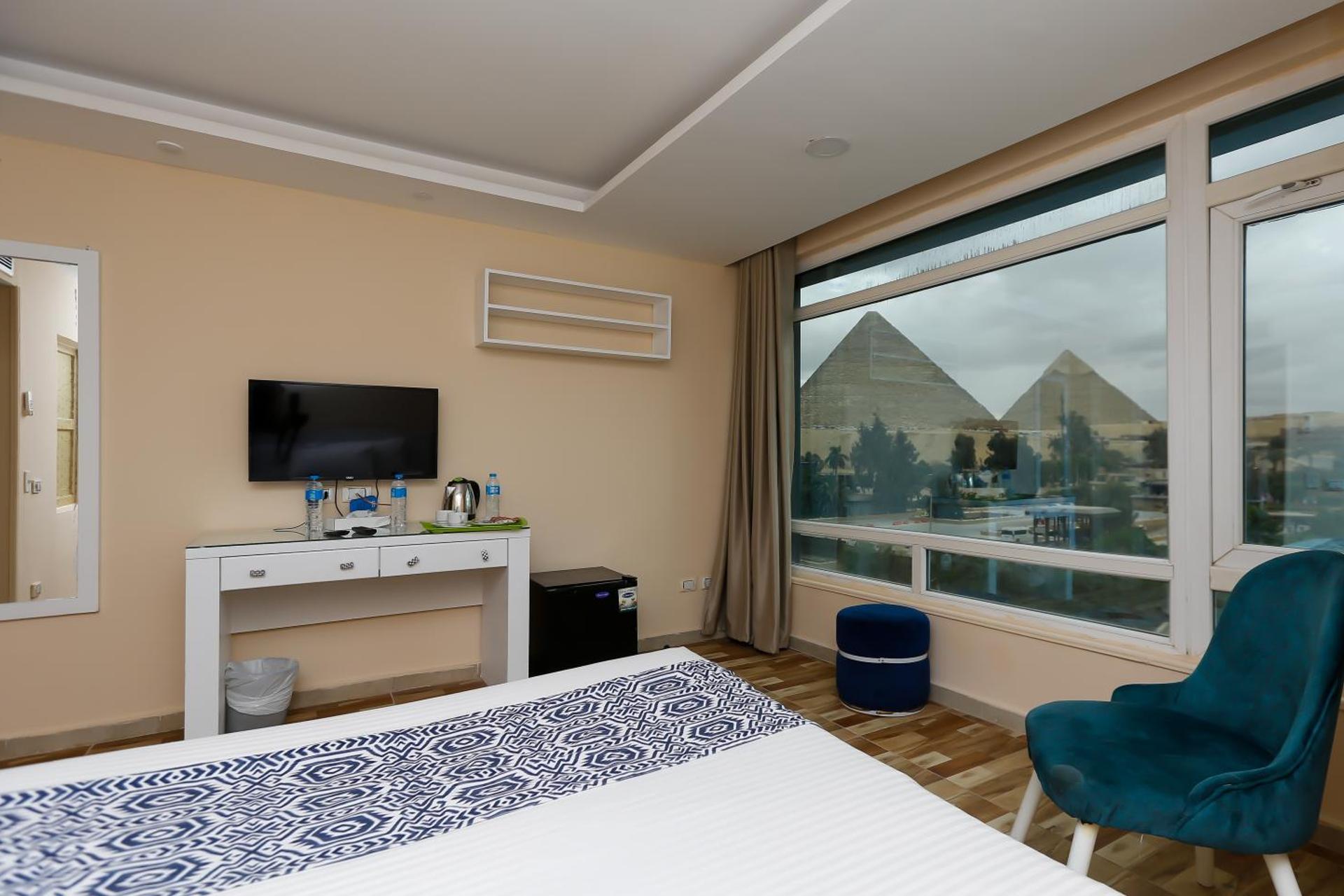 Turquoise Pyramids & Grand Egyptian museum view Hotel