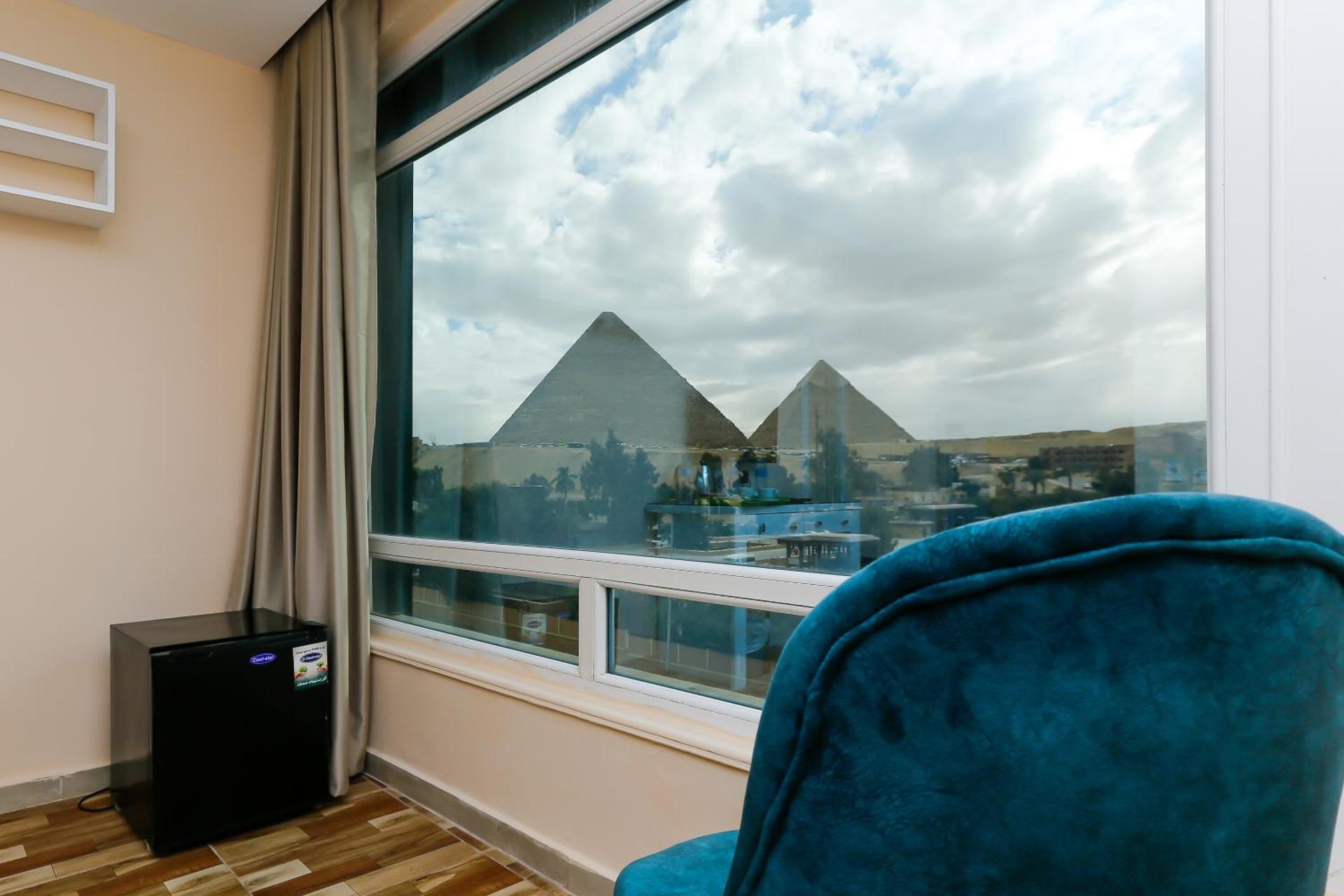 Turquoise Pyramids & Grand Egyptian museum view Hotel