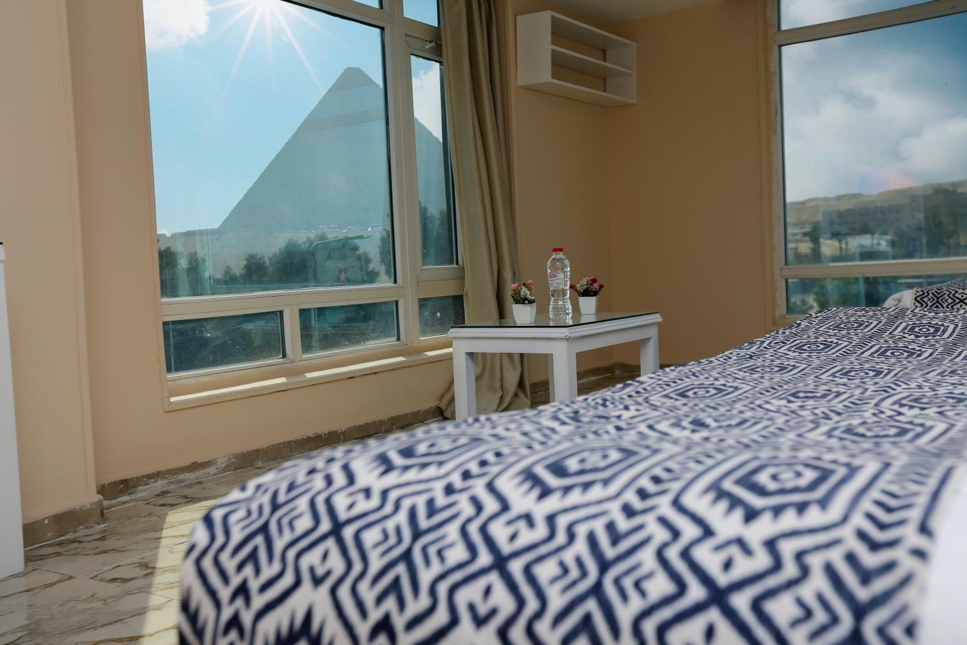 Turquoise Pyramids & Grand Egyptian museum view Hotel