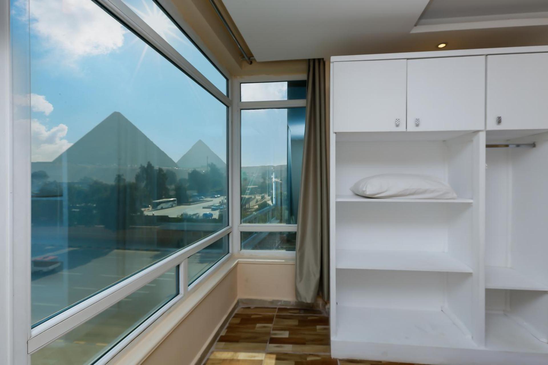 Turquoise Pyramids & Grand Egyptian museum view Hotel