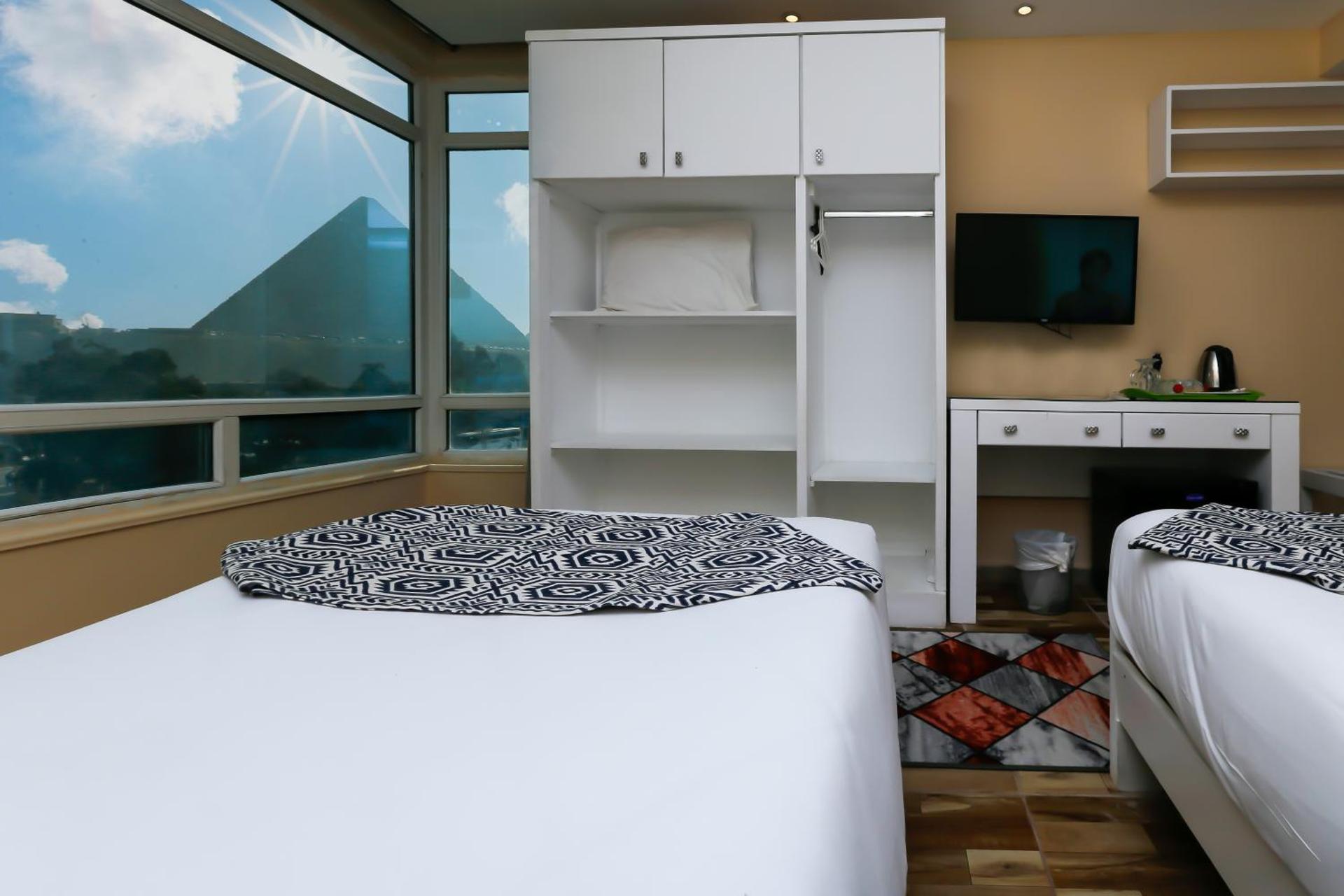 Turquoise Pyramids & Grand Egyptian museum view Hotel